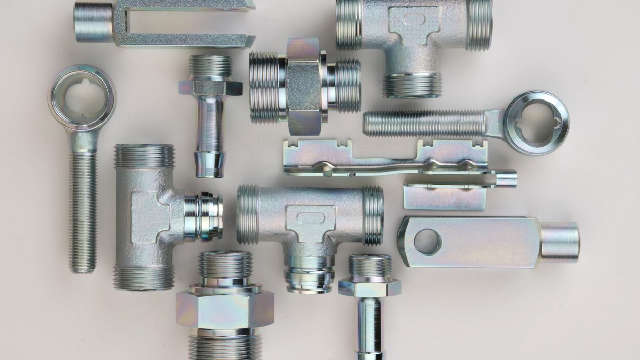 Arrangement of different parts plated with SurTec 680
